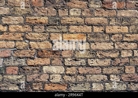 Background from an old wall made of red clinker bricks Stock Photo