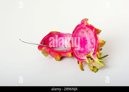 Pitahaya and triangular hylocereus (Hylocereus triangularis), cactus fruit, dragon fruit, pitaya, spoon Stock Photo