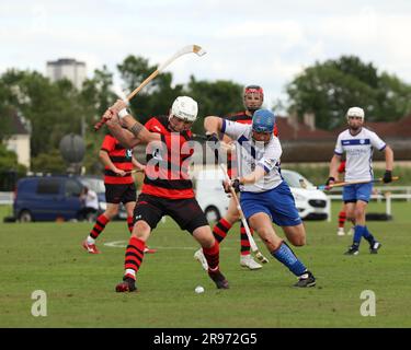 Glasgow, UK. 02nd June, 2023. Oban Camanachd player strikers the ball, Oban Camanachd vs Glasgow Mid Argyll, The Glasgow Celtic Society Challenge Cup Final, 24 June 2023 (Photo by /SportPix/Sipa USA) (Photo by /SportPix/SportPix/Sipa USA) Credit: Sipa USA/Alamy Live News Stock Photo