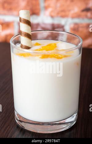 fruit cocktails made of yogurt, Healthy morning drink with sweetness on the background of old wood and bricks Stock Photo