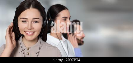Hotline operators with headsets in office, space for text. Banner design Stock Photo