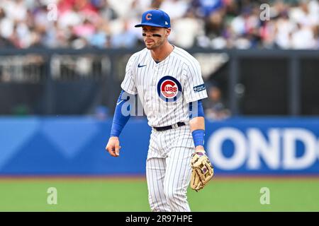 Nico Hoerner #2 of the Chicago Cubs tags a player from St. Louis