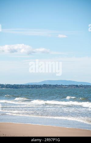 Fishermen on the beach of the tourist city of Atlántida in Canelones, Uruguay. Stock Photo