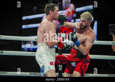 June 24, 2023, New York City, NY, New York, USA: NEW YORK, NY- JUNE 24: (R-L) Reshat Mati punches Dakota Linger in their fight on Saturday night in the Theatre at Madison Square Garden, New York City, New York, United States. (Credit Image: © Matt Davies/PX Imagens via ZUMA Press Wire) EDITORIAL USAGE ONLY! Not for Commercial USAGE! Stock Photo