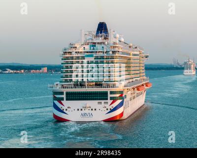 Arvia is an Excellence-class cruise ship in service for P&O Cruises, a subsidiary of Carnival Corporation & plc.  Arriving at Southampton aerial Stock Photo