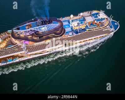 Norwegian prima cruise ship,  She is the first of six Project Leonardo class ships in the Norwegian Cruise Line NCL fleet.  Aerial view. Stock Photo