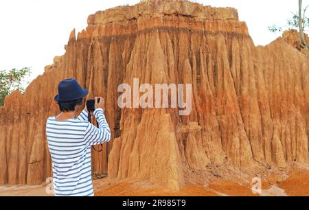 Visitor Shooting Photo of Lalu, Incredible Thailand's Canyon in Ta Phraya National Park, Sa Kaeo Province of Thailand Stock Photo