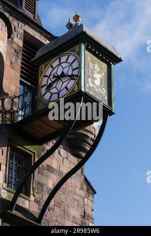 Clock on the tower of Canongate Tolbooth and Tolbooth Tavern at Royal Mile in city of Edinburgh, Scotland, UK. Added to the tower in 1884, emblazoned Stock Photo