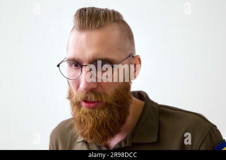 Non Exclusive: KYIV, URKAINE - JUNE 22, 2023 - Poet, musician, unit commander of the 68th Jaeger Brigade Pavlo Vyshebaba attends the 11th Internationa Stock Photo