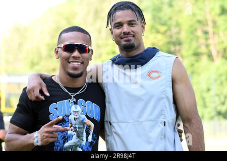 Cologne, Germany. 25th June, 2023. American Football: St. Brown Youth Football Camp. Equanimeous St. Brown (r) of the Chicago Bears and Osiris St. Brown of the Detroit Lions. Credit: Federico Gambarini/dpa/Alamy Live News Stock Photo