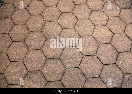 Street pavement with hexagonal concrete blocks, urban texture with a slight perspective Stock Photo