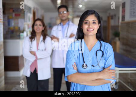 Portrait of Happy Indian Medical Team Standing In Hospital Corridor ...