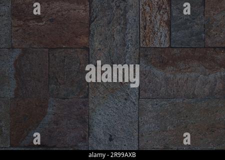 Old reddish stone pavement texture, background Stock Photo