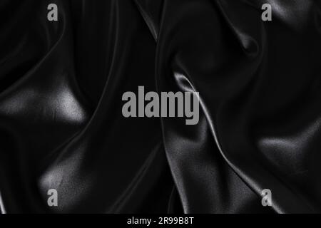 Silk fabric, abstract wavy black satin fabric background Stock Photo