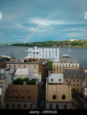 View of a rainbow over the St. Lawrence River, in Québec City, Quebec, Canada Stock Photo