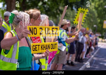 London, UK. 25th June, 2023. Activists hold placards expressing their opinion during the demonstration. Activists gathered at Marble Arch in Central London to protest against the ULEZ (Ultra Low Emission Zone) Expansion by Mayor of London Sadiq Khan. Credit: SOPA Images Limited/Alamy Live News Stock Photo