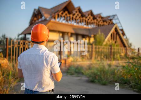 Worker, Inspector or engineer is checking and inspecting the building Stock Photo
