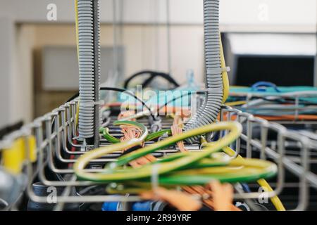 Proper cable management is essential for maintaining a large network of servers. Stock Photo