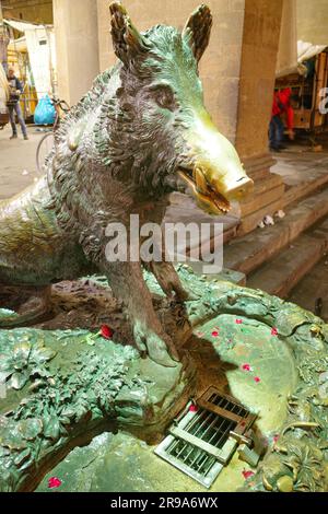 Florence, Italy - 22 Nov, 2022: The Porcellino bronze hog statue at Mercato Nuovo Stock Photo