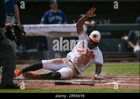 Baltimore Orioles' Jorge Mateo slides safely into home to score