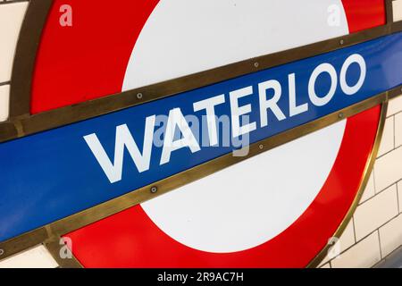 Waterloo Underground Station sign and logo on the wall next to platform. England, UK. Concept: The Tube, Transport for London, Waterloo Tube Station Stock Photo