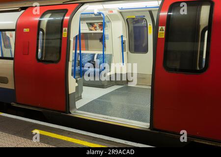 London Underground train carriage at Waterloo tube station standing at the platform with its doors open. Theme: tube strikes, driver strike Stock Photo