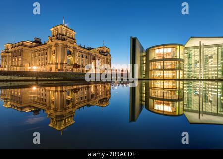 The Reichstag and Paul Loebe House with the Spree in Berlin by night Stock Photo
