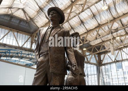 The National Windrush Monument by the sculptor Basil Watson, commemorating British West Indian immigrants arriving in the UK. London Waterloo, England Stock Photo