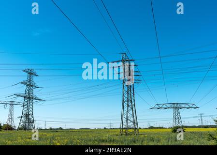 Overhead power lines in rural Germany Stock Photo
