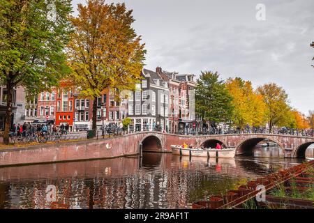 Amsterdam, the Netherlands - October 17, 2021: Canals and typical dutch architecture in Amsterdam, the capital of the Netherlands. Amsterdam is one of Stock Photo