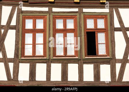 Windows of a historic half-timbered house in Germany Stock Photo