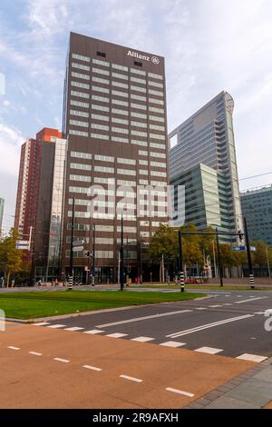 Rotterdam, NL - OCT 10, 2021: Street view and modern architecture with business towers in downtown Rotterdam. Rotterdam is the second largest city of Stock Photo