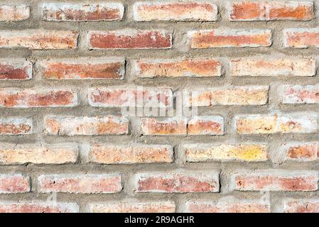 Background from an old, worn red brick wall Stock Photo