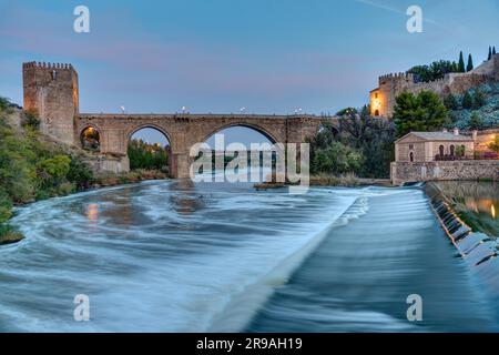 The Puente de San Martin in Toledo, Spain, at dawn Stock Photo