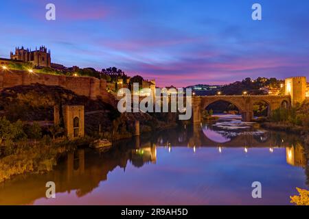 The San Martin Bridge in Toledo in front of sunrise Stock Photo