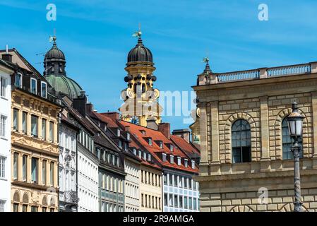 Renovated old buildings in Munich with the Theatine Church in the background Stock Photo