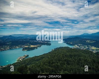 Aerial view of Worthersee (Wörthersee) and Klagenfurt in Carinthia, Austria, from the Pyramidenkogel lookout tower in the summer cloudy weather Stock Photo