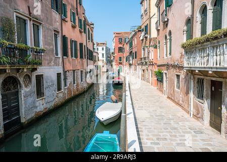 Small canal in the old town of Venice, Italy Stock Photo