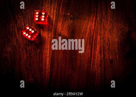 Two red dices showing a pair of sixes Stock Photo