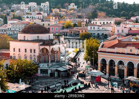 Athens, Greece - 25 Nov 2021: Monastiraki is a flea market neighborhood in the old town of Athens, and is one of the principal shopping districts in A Stock Photo