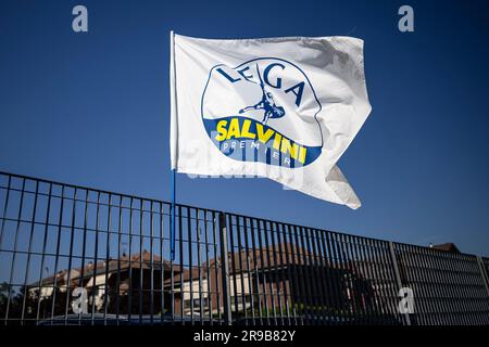 Chivasso, Italy. 25 June 2023. A Lega Nord flag waves in front of some houses during the congress of the Lega Nord Piemonte (Piedmont Northern League), a regional section of the Lega Nord (Northern League) political party. The congress re-elected the current secretary Riccardo Molinari. Credit: Nicolò Campo/Alamy Live News Stock Photo