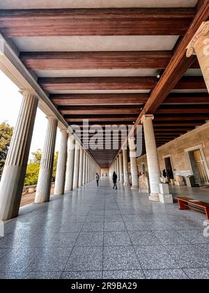 Athens, Greece - 25 Nov 2021: The Stoa of Attalos is a covered portico in the Agora of Athens. Reconstructed in 1956 and houses the Museum of the Anci Stock Photo