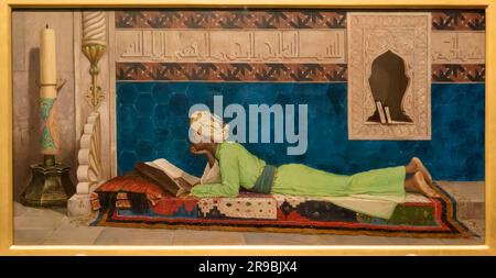 Young Emir Studying, oil on canvas painting Istanbul (?) Turkey 1878 by Osman Handy Bey in the Louvre Museum, Abu Dhabi, UAE Stock Photo