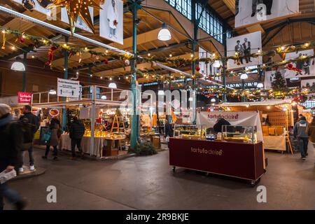 Berlin, Germany - 17 DEC 2021: Markthalle Neun is an indoor market with international food vendors & shops, plus occasional community events, located Stock Photo