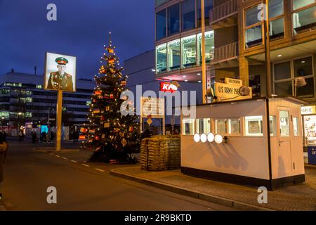 Berlin, Germany - 17 DEC 2021: Checkpoint Charlie was the best known Berlin Wall crossing point between East Berlin and West Berlin during the Cold Wa Stock Photo