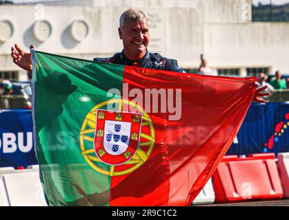 Lisbon, Portugal. 25th June, 2023. Former Formula One car driver David Coulthard with a flag at a Red Bull Showrun in Lisbon. (Photo by Miguel Reis/SOPA Images/Sipa USA) Credit: Sipa USA/Alamy Live News Stock Photo