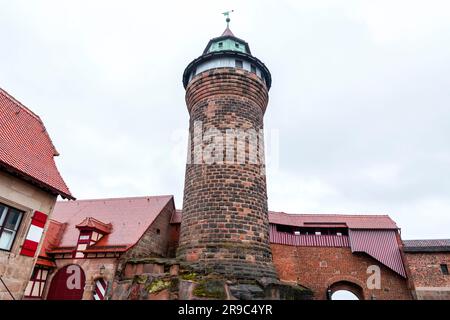 The iconic Sinwell Tower, part of the Kaiserburg, the royal fortification in old town, Nuremberg, Bavaria, Germany. Stock Photo