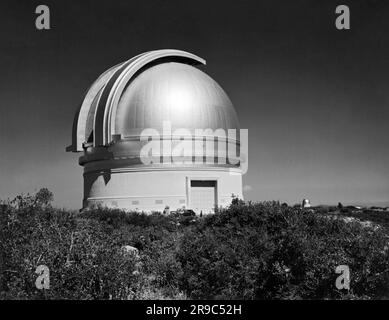 Palomar Mountain, California:  1941 Cal Tech's Mount Palomar Observatory in San Diego County. The smaller observatory at the right houses the 18' refracting telescope. Stock Photo
