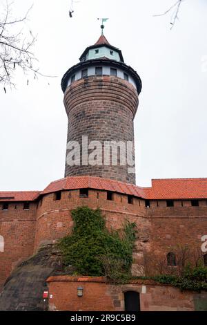 Nuremberg, Germany - December 28, 2021: The iconic Sinwell Tower, part of the Kaiserburg, the royal fortification in old town, Nuremberg, Bavaria, Ger Stock Photo