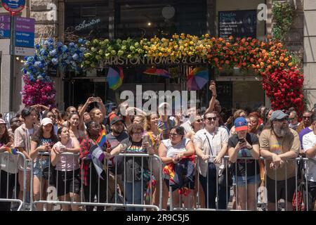 NEW YORK, NEW YORK - JUNE 25: Spectators watch the annual New York City Pride Parade on June 25, 2023 in New York City. Stock Photo